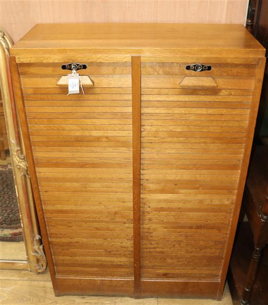 An oak tambour filing cabinet W.80cm